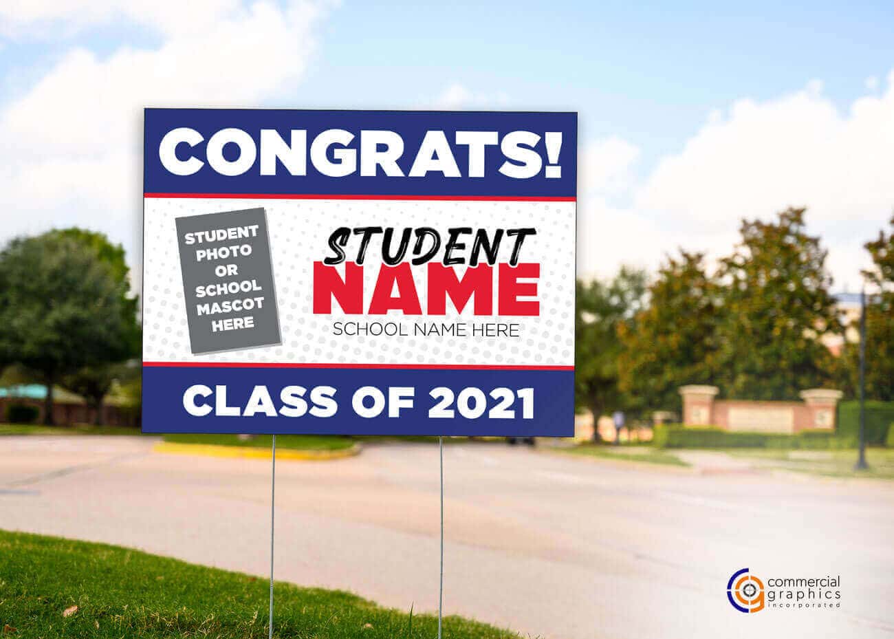 Graduate Lawn sign on busy street corner for 2021 grad